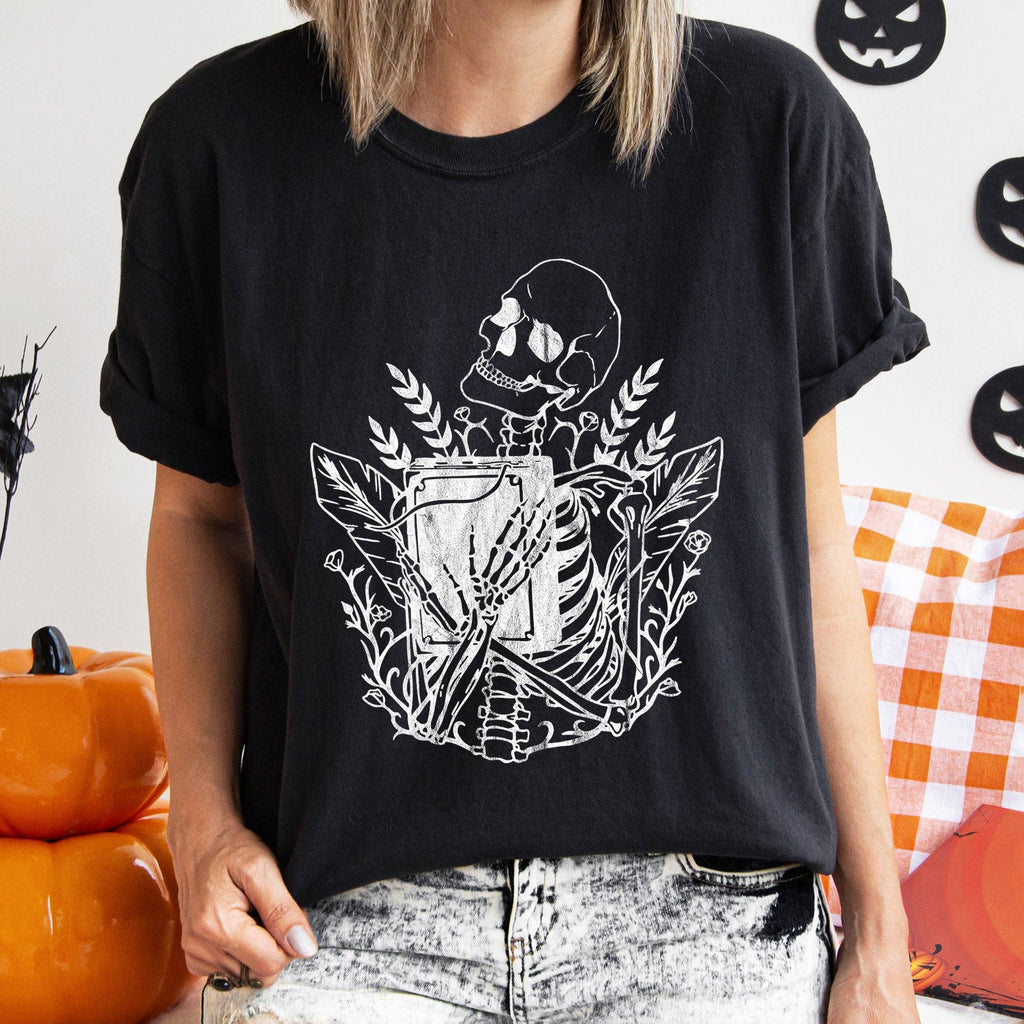 Skeleton and the Book Retro Halloween White Print - Adult & Kids T-Shirts, Sweatshirts & Hoodies apparel design preview 1