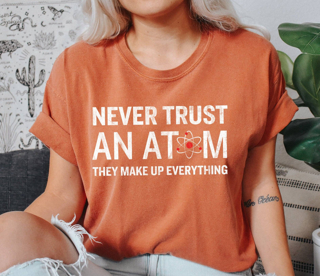 Never Trust An Atom Funny Science - Adult & Kids T-Shirts, Sweatshirts & Hoodies apparel design preview 1