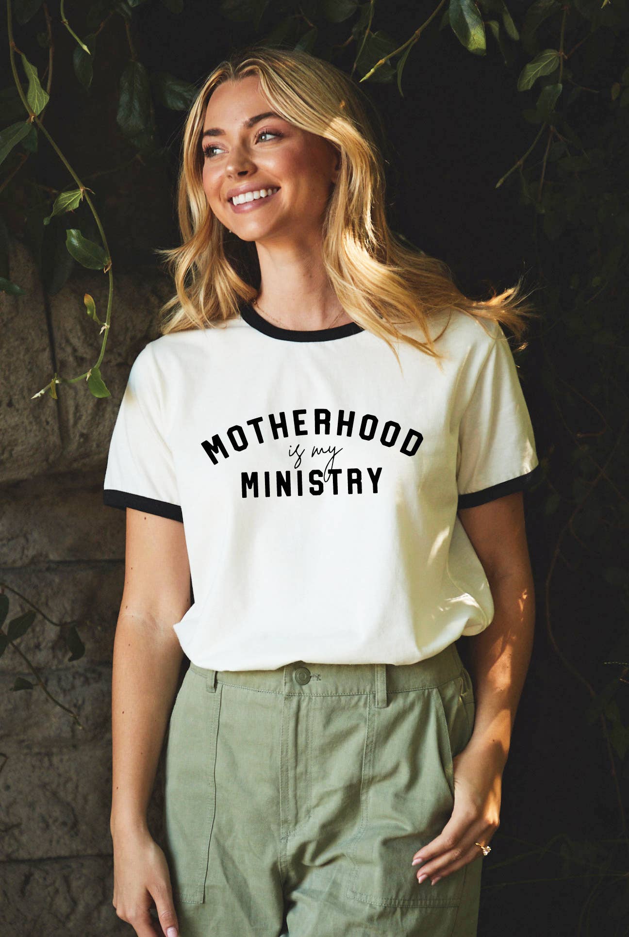 Motherhood Is My Ministry Ringer Graphic Top - Adult & Kids T-Shirts, Sweatshirts & Hoodies apparel design preview 1