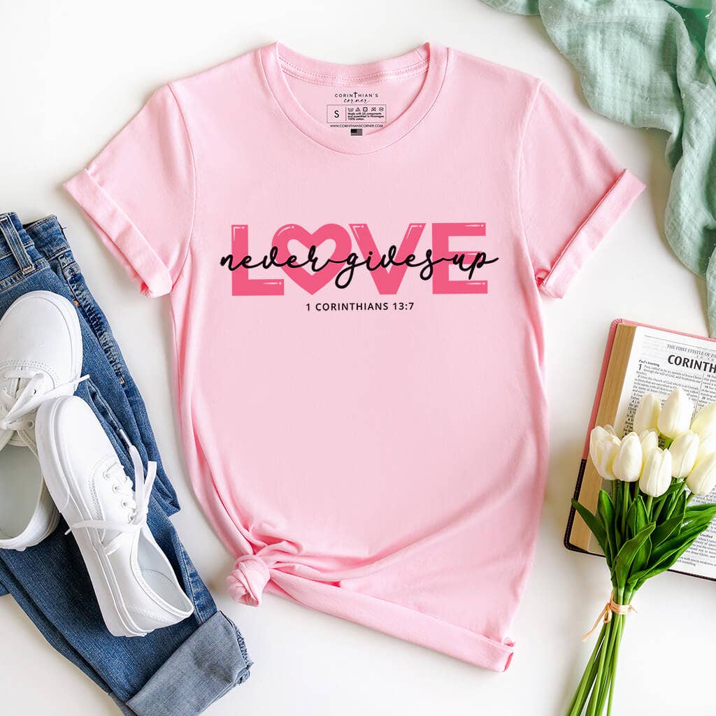 Love Never Gives Up Graphic - Adult & Kids T-Shirts, Sweatshirts & Hoodies apparel design preview 1