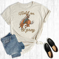 Hold On and Pray Cowboy Graphic - Adult & Kids T-Shirts, Sweatshirts & Hoodies apparel design preview 1