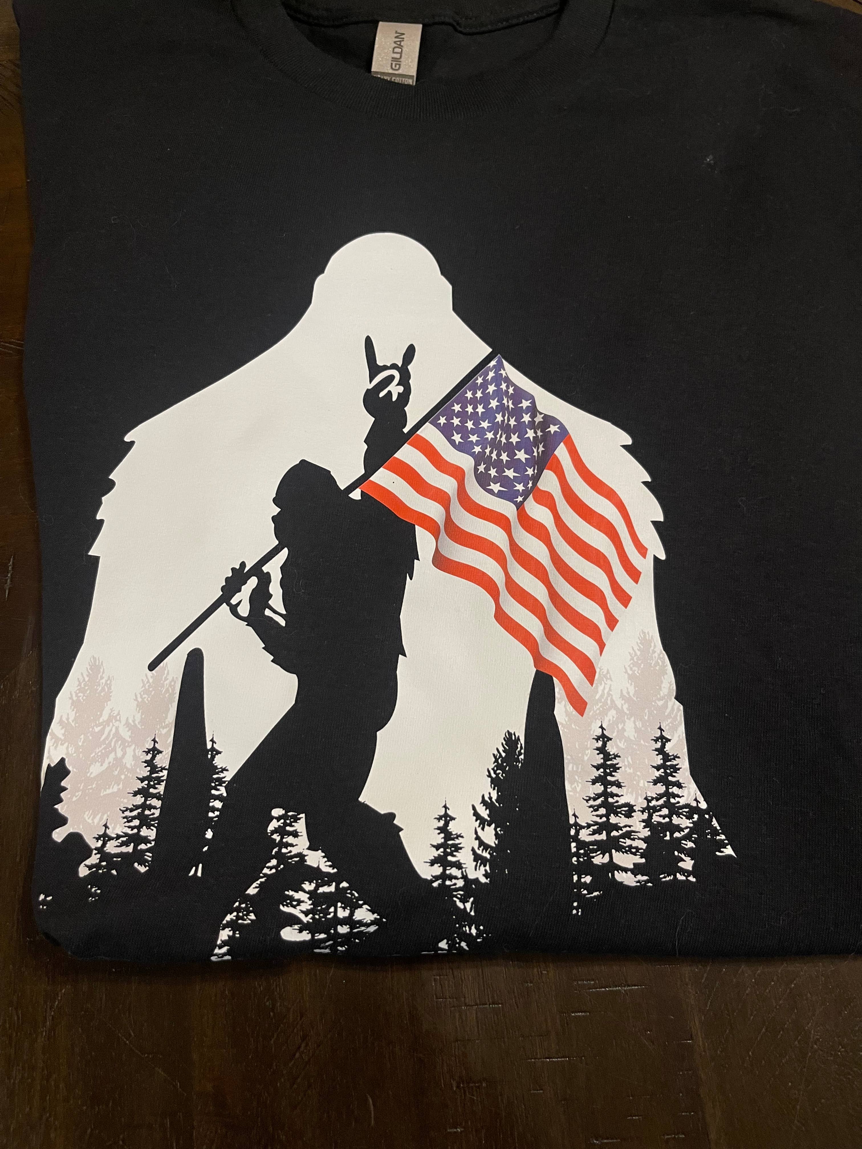 Patriotic July 4th Bigfoot (Black) - Adult & Kids T-Shirts, Sweatshirts & Hoodies apparel design preview 1
