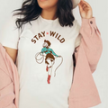 Stay Wild Pinup Cowgirl Western Graphic - Adult & Kids T-Shirts, Sweatshirts & Hoodies apparel design preview 1