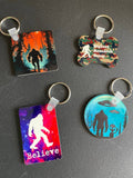 Squatchin' Country Colorful Bigfoot Keychains - Adult & Kids T-Shirts, Sweatshirts & Hoodies apparel design preview 1