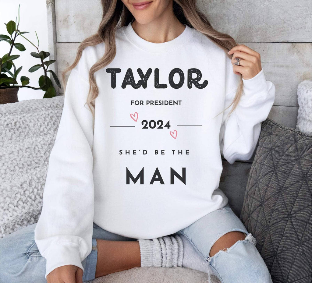 Taylor For President 2024 She'd Be the Man Campaign - Adult & Kids T-Shirts, Sweatshirts & Hoodies apparel design preview 1