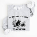 It's Never Too Late To Give Up, Raccoon, Funny - Adult & Kids T-Shirts, Sweatshirts & Hoodies apparel design preview 1