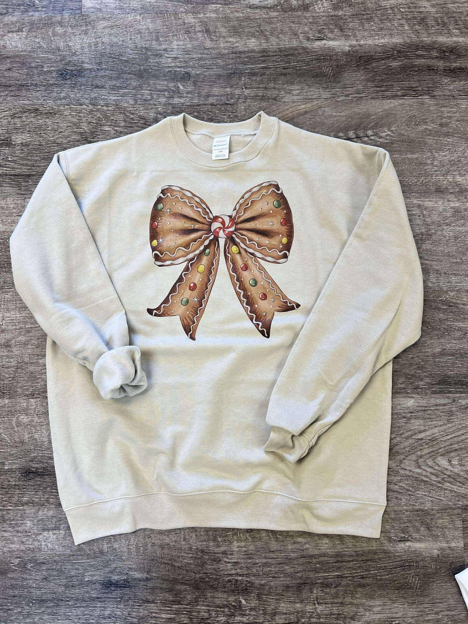 Gingerbread Christmas Bow On Sand - Adult & Kids T-Shirts, Sweatshirts & Hoodies apparel design preview 1