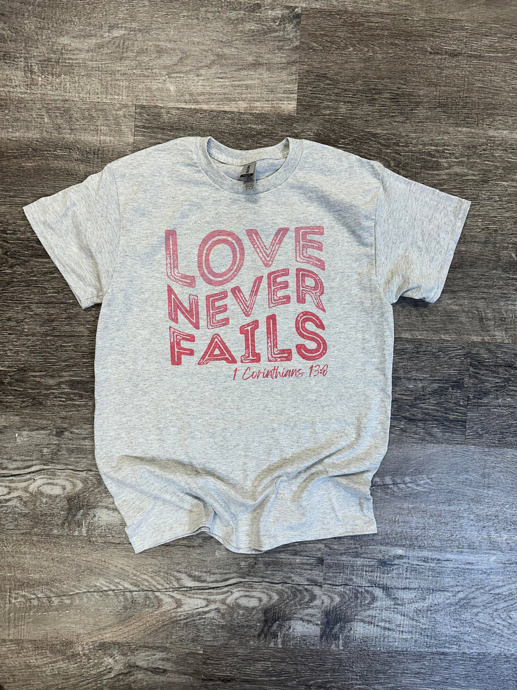 Love Never Fails 1 Corinthians 13:8 Ash Gray - Adult & Kids T-Shirts, Sweatshirts & Hoodies apparel design preview 1