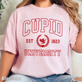 Cupid University Valentine'S Day Comfort Colors - Adult & Kids T-Shirts, Sweatshirts & Hoodies apparel design preview 1
