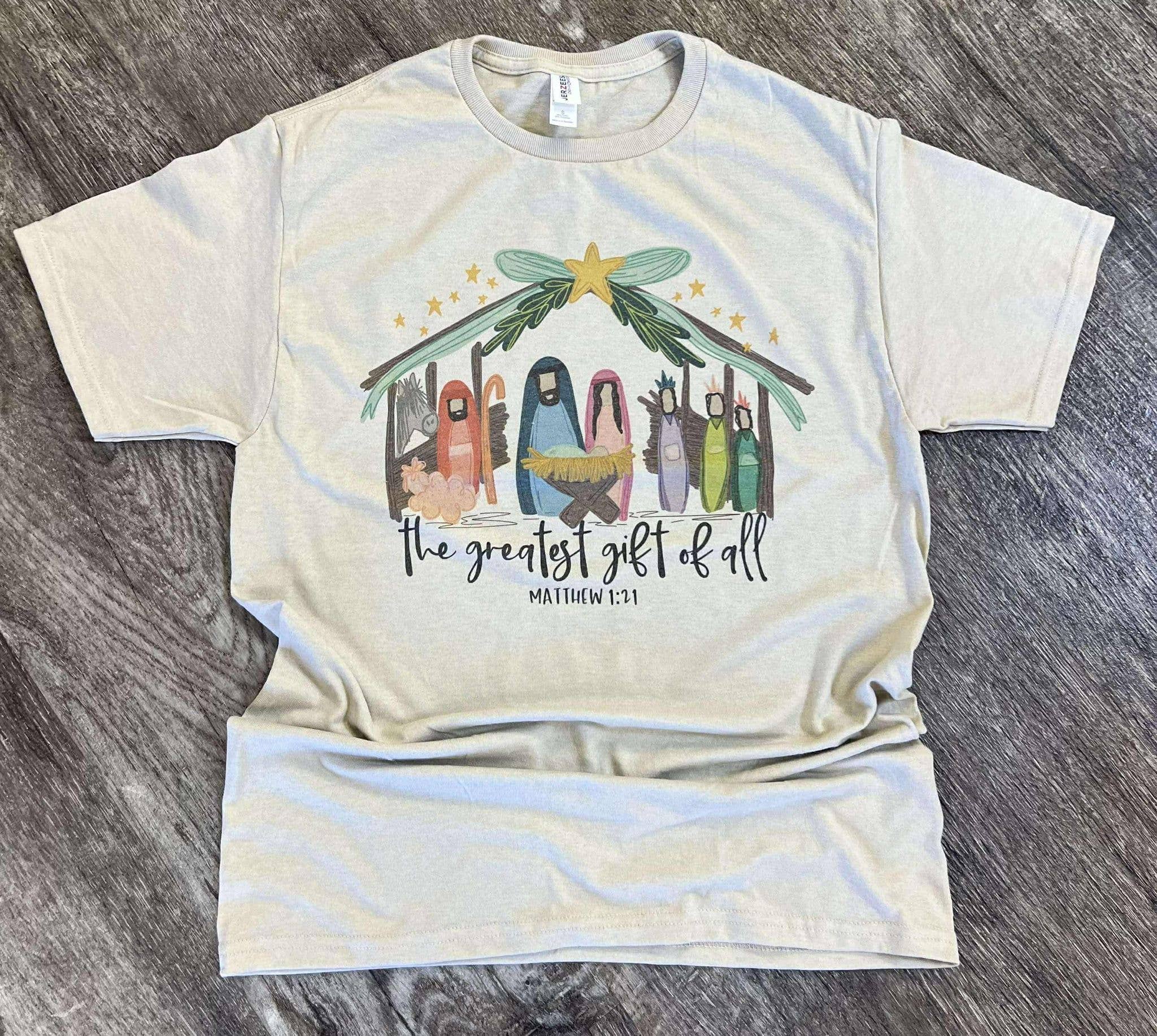 The Greatest Gift of All Jesus Nativity Scene On Sand - Adult & Kids T-Shirts, Sweatshirts & Hoodies apparel design preview 1