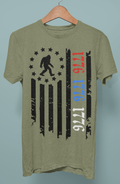 Patriotic 1776 Bigfoot Flag Heather Military Green - Adult & Kids T-Shirts, Sweatshirts & Hoodies apparel design preview 1
