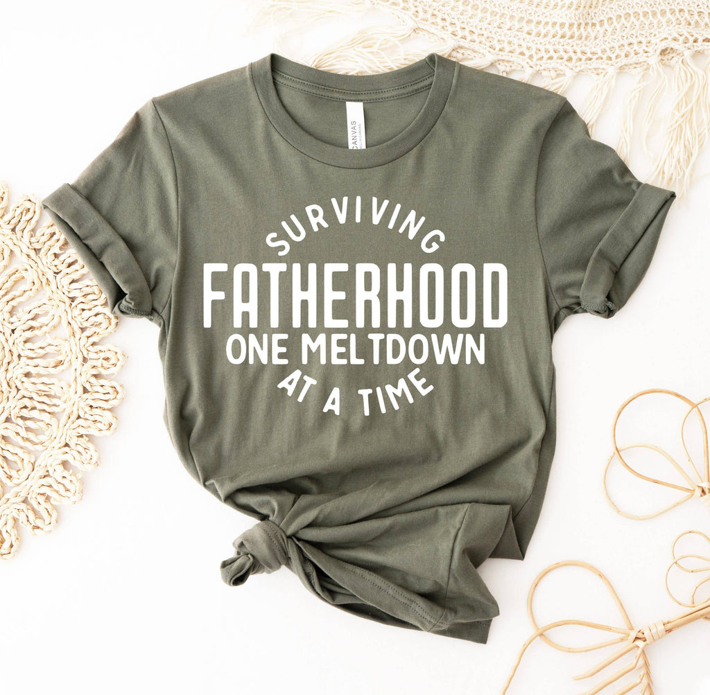 Surviving Fatherhood One Meltdown At A Time - Adult & Kids T-Shirts, Sweatshirts & Hoodies apparel design preview 1