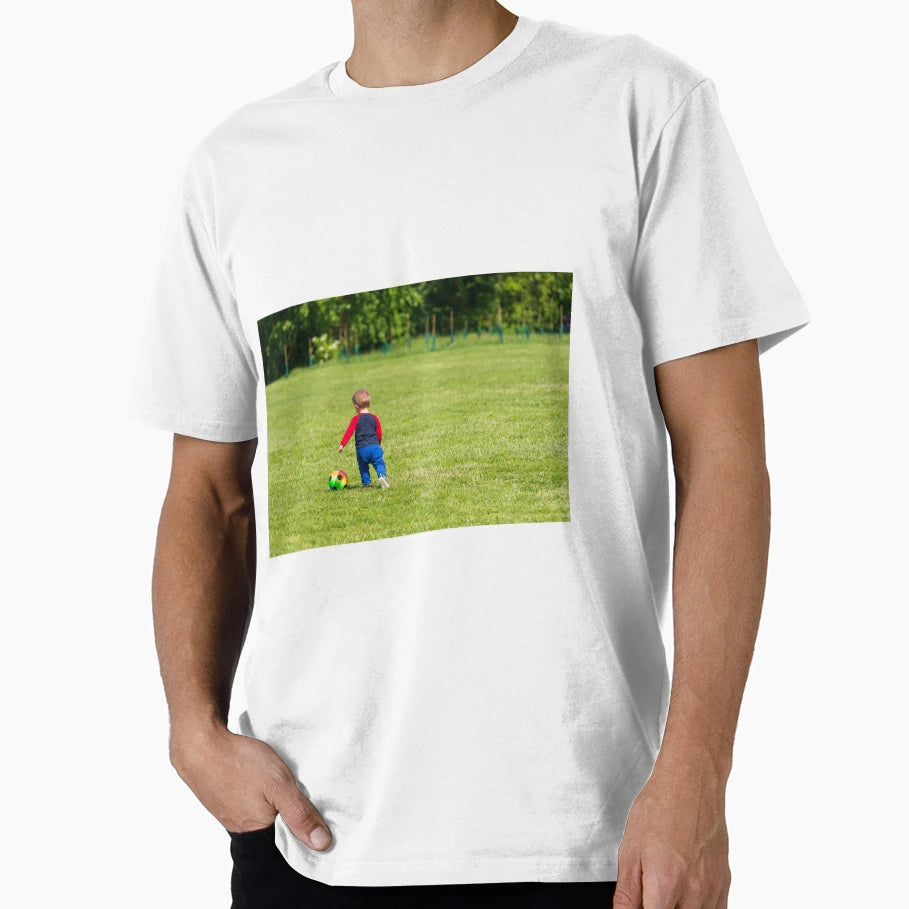 Child Plays Colorful Ball Green Lawn T-Shirt - Novelty Apparel for Adults - T-Shirt, Sweatshirt, Hoodie